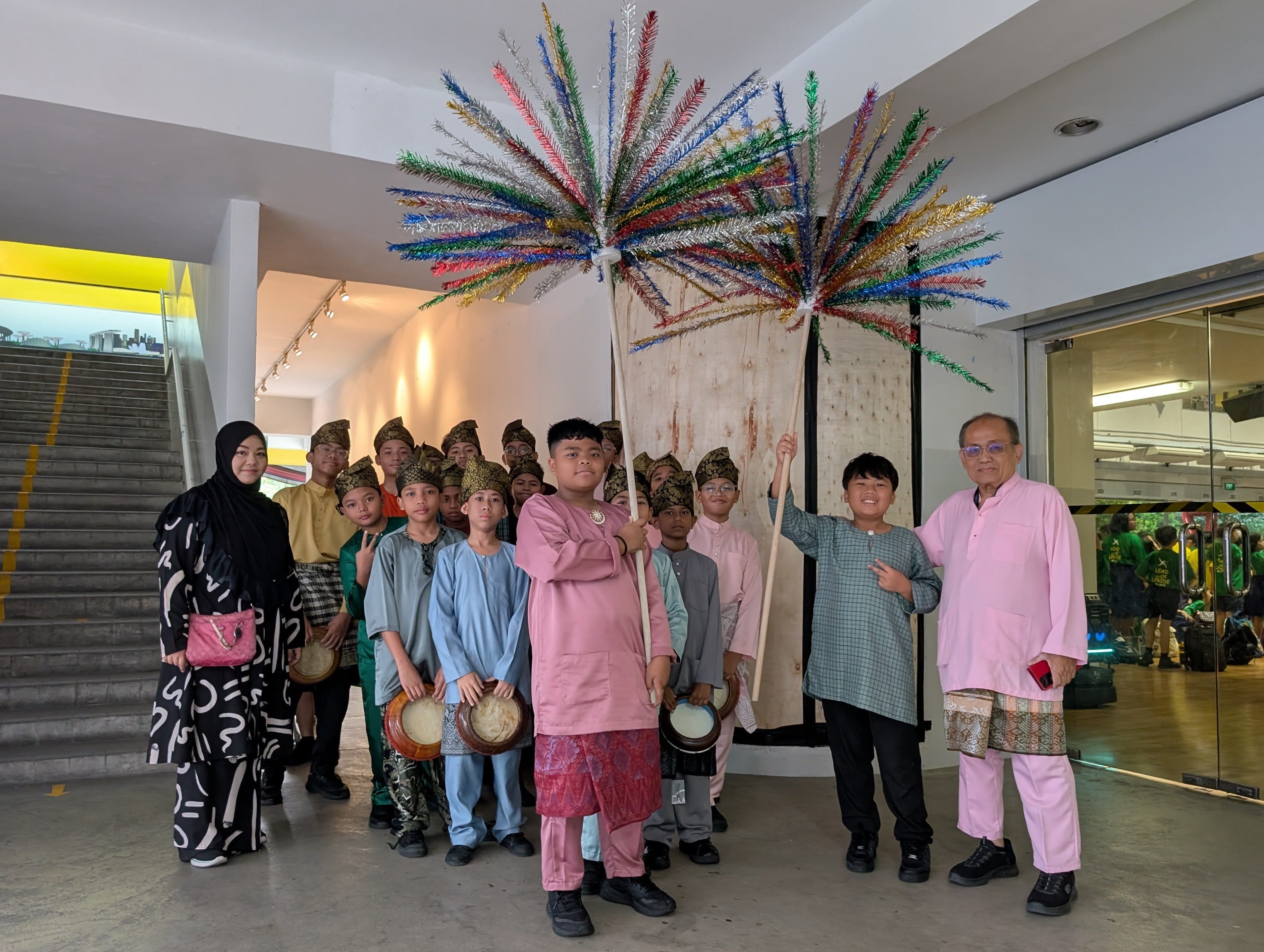 Kompang boys outside the school hall, ready to enter for their opening performance